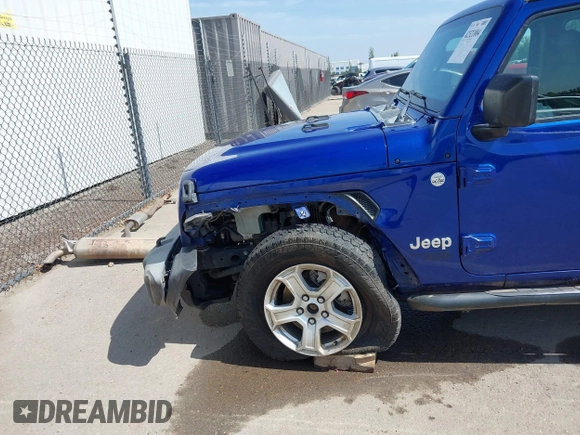 2018 Jeep Wrangler Unlimited Sport S z VIN 1C4HJXDG7JW299534, wystawiony jako IAAI lot #42321004 z przebiegiem 110 206 mil mil oraz . Historia ofert i sprzedaży dostępna na DreamBid. Obrazek 6.