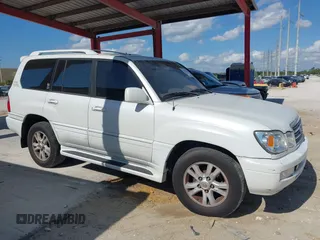 2003 Lexus LX 470 with VIN JTJHT00WX33523623, listed as a IAAI auction lot 42028889 with 317,700 mi miles and . Bid and sale history available at DreamBid. Image 13.