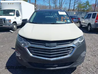 2019 Chevrolet Equinox LT z VIN 3GNAXVEX8KL309330, wystawiony jako IAAI lot #42037575 z przebiegiem 97 948 mil mil oraz . Historia ofert i sprzedaży dostępna na DreamBid. Obrazek 12.