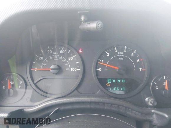2008 Jeep Wrangler Unlimited X z VIN 1J4GA39148L560004, wystawiony jako IAAI lot #42523657 z przebiegiem 116 619 mil mil oraz . Historia ofert i sprzedaży dostępna na DreamBid. Obrazek 7.