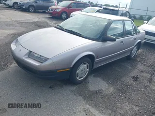 1995 Saturn SL с VIN 1G8ZH5286SZ146072, выставлен на аукционе IAAI как лот 42679638 с пробегом 92 705 миль миль и . История ставок и продаж доступна на DreamBid. Изображение 2.