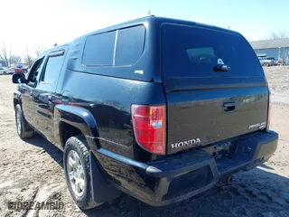 2011 Honda Ridgeline RTS with VIN 5FPYK1F48BB005889, listed as a IAAI auction lot 41761367 with 146,974 mi miles. Bid and sale history available at carsss.com. Image 3.