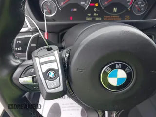 2019 BMW M4 with VIN WBS4Y9C53KAH82910, listed as a IAAI auction lot 41570315 with 59,227 mi miles. Bid and sale history available at carsss.com. Image 12.