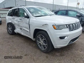 2021 Jeep Grand Cherokee Overland with VIN 1C4RJFCT4MC591385, listed as a IAAI auction lot 42619913 with 61,292 mi miles and . Bid and sale history available at DreamBid. Image 1.