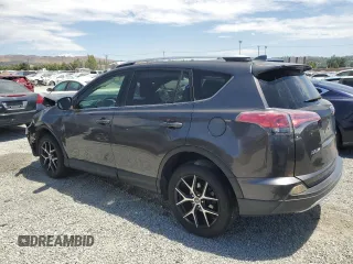 2016 Toyota RAV4 SE with VIN JTMNFREV2GJ072643, listed as a Copart auction lot 63879695 with 104,118 mi miles and Salvage title. Bid and sale history available at DreamBid. Image 2.