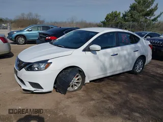 2018 Nissan Sentra SV z VIN 3N1AB7AP3JL658003, wystawiony jako IAAI lot #42115326 z przebiegiem 50 312 mil mil oraz . Historia ofert i sprzedaży dostępna na DreamBid. Obrazek 2.