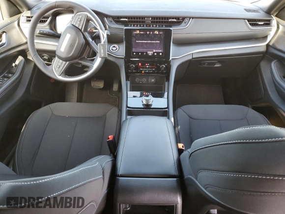2025 Jeep Grand Cherokee Laredo with VIN 1C4RJHAG0SC268997, listed as a Copart auction lot 45860945 with 1,036 mi miles and Salvage Title. Bid and sale history available at DreamBid. Image 8.