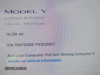 2023 Tesla Model Y Long Range with VIN 7SAYGDEE7PF832007, listed as a IAAI auction lot 41751598 with 14,126 mi miles and . Bid and sale history available at DreamBid. Image 15.