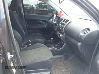 2011 Scion xD with VIN JTKKU4B46B1008873, listed as a IAAI auction lot 41871913 with 145,722 mi miles. Bid and sale history available at carsss.com. Image 5.