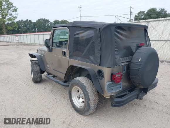 2003 Jeep Wrangler SE with VIN 1J4FA29113P304250, listed as a IAAI auction lot 40917099 with 191,589 mi miles. Bid and sale history available at carsss.com. Image 3.