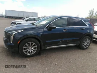 2021 Cadillac XT4 FWD Premium Luxury with VIN 1GYFZCR48MF004009, listed as a IAAI auction lot 41956723 with 82,483 mi miles. Bid and sale history available at carsss.com. Image 14.