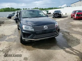 2016 Volkswagen Touareg Sport z VIN WVGEF9BP3GD008823, wystawiony jako Copart lot #56838985 z przebiegiem 49 612 mil mil oraz Nie do naprawy • Non repairable. Historia ofert i sprzedaży dostępna na DreamBid. Obrazek 15.