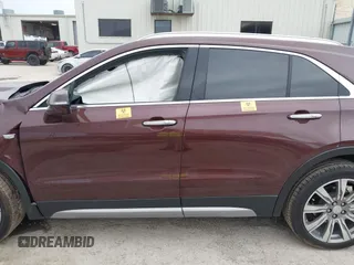 2022 Cadillac XT4 FWD Premium Luxury with VIN 1GYFZCR4XNF116845, listed as a IAAI auction lot 42128210 with 43,423 mi miles and . Bid and sale history available at DreamBid. Image 13.