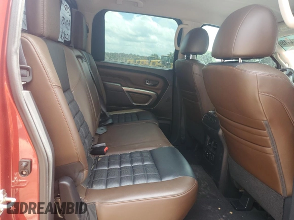 2017 Nissan Titan Pro-4X z VIN 1N6BA1F43HN562363, wystawiony jako Copart lot #58604115 z przebiegiem 102 412 mil mil oraz Czysty tytuł • Clean title. Historia ofert i sprzedaży dostępna na DreamBid. Obrazek 10.
