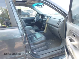 2006 Honda Pilot EX-L with VIN 2HKYF18586H556169, listed as a IAAI auction lot 42031231 with 260,963 mi miles and . Bid and sale history available at DreamBid. Image 5.