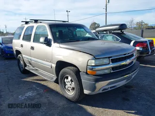 2003 Chevrolet Tahoe LS z VIN 1GNEC13V13J163837, wystawiony jako IAAI lot #41641915 z przebiegiem 102 312 mil mil oraz . Historia ofert i sprzedaży dostępna na DreamBid. Obrazek 1.