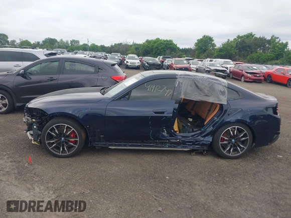 2024 BMW i4 M50 z VIN WBY33AW09RFS45891, wystawiony jako IAAI lot #41912747 z przebiegiem 313 988 mil mil oraz . Historia ofert i sprzedaży dostępna na DreamBid. Obrazek 14.