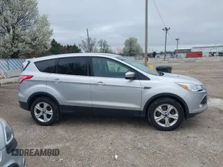 2016 Ford Escape SE with VIN 1FMCU9GX3GUA96262, listed as a IAAI auction lot 41915524 with 64,434 mi miles and . Bid and sale history available at DreamBid. Image 13.