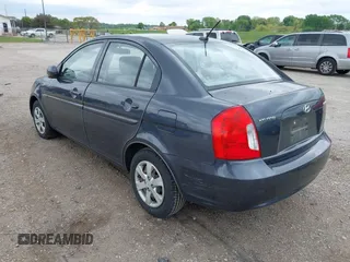 2010 Hyundai Accent GLS with VIN KMHCN4AC5AU464938, listed as a IAAI auction lot 42161461 with 134,296 mi miles. Bid and sale history available at carsss.com. Image 3.