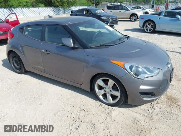 2013 Hyundai Veloster w/Gray Int with VIN KMHTC6AD9DU128725, listed as a IAAI auction lot 42648356 with 168,109 mi miles and . Bid and sale history available at DreamBid. Image 1.