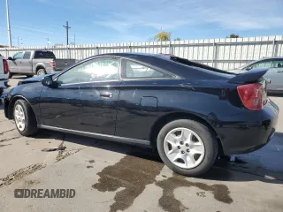 2004 Toyota Celica GT with VIN JTDDR32T140180241, listed as a Copart auction lot 77031284 with 194,669 mi miles and Clean Title. Bid and sale history available at DreamBid. Image 2.