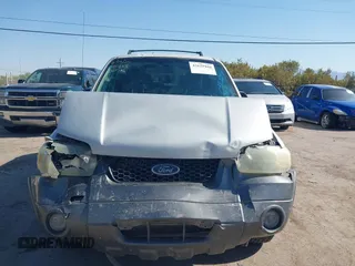 2006 Ford Escape XLT z VIN 1FMCU93136KC15231, wystawiony jako IAAI lot #42625410 z przebiegiem 117 479 mil mil oraz . Historia ofert i sprzedaży dostępna na DreamBid. Obrazek 13.