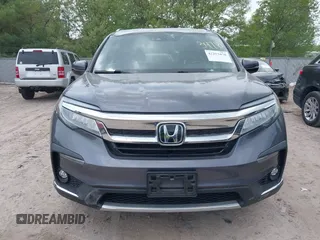2020 Honda Pilot Elite with VIN 5FNYF6H00LB027472, listed as a IAAI auction lot 42253478 with 69,988 mi miles and . Bid and sale history available at DreamBid. Image 12.