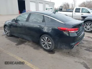 2016 Kia Optima SX Turbo with VIN 5XXGW4L2XGG052746, listed as a IAAI auction lot 41306792 with 69,571 mi miles and . Bid and sale history available at carsss.com. Image 3.