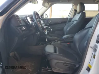 2019 MINI Countryman Cooper S with VIN WMZYT5C59K3E63967, listed as a Copart auction lot 73022644 with 56,638 mi miles and Salvage Title. Bid and sale history available at carsss.com. Image 7.
