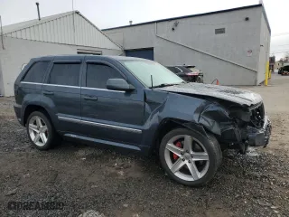 2007 Jeep Grand Cherokee SRT-8 with VIN 1J8HR78367C658164, listed as a Copart auction lot 82672764 with 75,272 mi miles and Salvage Title. Bid and sale history available at carsss.com. Image 4.
