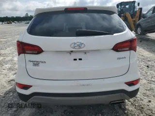 2017 Hyundai Santa Fe 2.4L z VIN 5XYZT3LB8HG434749, wystawiony jako Copart lot #60261275 z przebiegiem 128 099 mil mil oraz Czysty tytuł • Clean title. Historia ofert i sprzedaży dostępna na DreamBid. Obrazek 6.