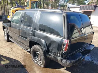 2000 GMC Denali with VIN 1GKEK13R1YR129862, listed as a IAAI auction lot 41833054 with 223,811 mi miles. Bid and sale history available at carsss.com. Image 3.