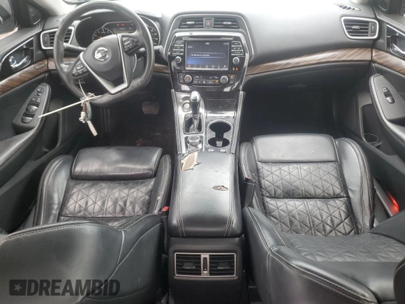 2016 Nissan Maxima Platinum with VIN 1N4AA6AP8GC406798, listed as a Copart auction lot 60143595 with 134,704 mi miles and Salvage title. Bid and sale history available at DreamBid. Image 8.