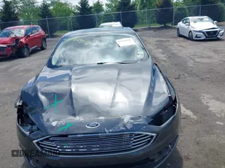 2017 Ford Fusion Titanium z VIN 3FA6P0SUXHR184919, wystawiony jako IAAI lot #42258918 z przebiegiem Nie podano mil oraz . Historia ofert i sprzedaży dostępna na DreamBid. Obrazek 13.