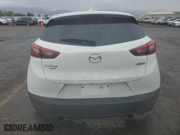 2019 Mazda CX-3 Touring with VIN JM1DKFC77K0450190, listed as a Copart auction lot 49171075 with 57,115 mi miles and Salvage Title. Bid and sale history available at carsss.com. Image 6.