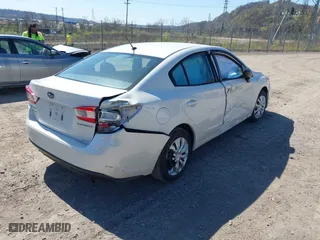 2018 Subaru Impreza with VIN 4S3GKAA6XJ3613244, listed as a IAAI auction lot 42036955 with 77,272 mi miles. Bid and sale history available at carsss.com. Image 4.