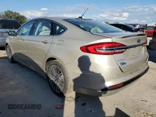 2018 Ford Fusion Hybrid Titanium with VIN 3FA6P0RU7JR120512, listed as a Copart auction lot 38885413 with 74,858 mi miles. Bid and sale history available at carsss.com. Image 2.