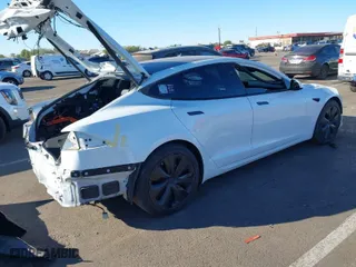 2022 Tesla Model S Plaid with VIN 5YJSA1E64NF479959, listed as a IAAI auction lot 41057673 with 27,203 mi miles. Bid and sale history available at carsss.com. Image 4.