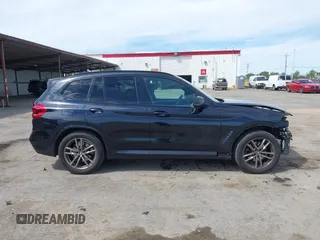 2021 BMW X3 sDrive30i with VIN 5UXTY3C09M9E84594, listed as a IAAI auction lot 42013486 with 58,044 mi miles and . Bid and sale history available at DreamBid. Image 14.