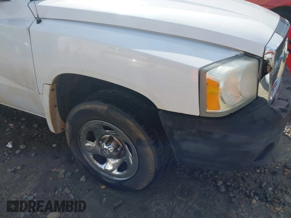 2005 Dodge Dakota ST with VIN 1D7HE22K75S160795, listed as a IAAI auction lot 41569099 with 254,592 mi miles and . Bid and sale history available at DreamBid. Image 14.