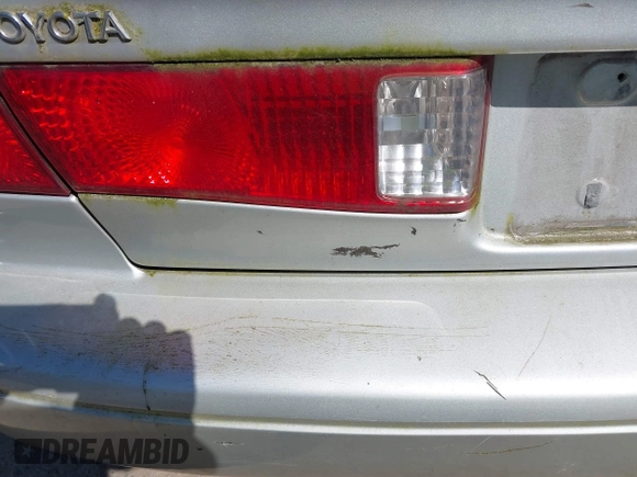 2000 Toyota Camry CE z VIN JT2BG22K6Y0451632, wystawiony jako IAAI lot #42030842 z przebiegiem 200 734 mil mil oraz . Historia ofert i sprzedaży dostępna na DreamBid. Obrazek 13.