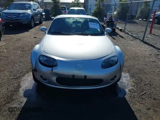 2007 Mazda MX-5 Miata Sport z VIN JM1NC25F170135777, wystawiony jako IAAI lot #41746586 z przebiegiem 107 302 mil mil oraz . Historia ofert i sprzedaży dostępna na DreamBid. Obrazek 12.