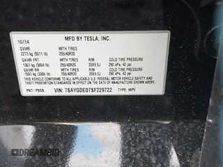 2025 Tesla Model Y Long Range with VIN 7SAYGDED7SF229722, listed as a IAAI auction lot 41330526 with 2,901 mi miles and . Bid and sale history available at DreamBid. Image 9.