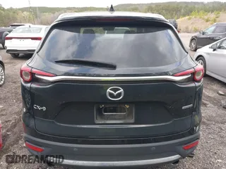2021 Mazda CX-9 Carbon Edition with VIN JM3TCADY4M0517535, listed as a IAAI auction lot 41821261 with 60,053 mi miles. Bid and sale history available at carsss.com. Image 16.