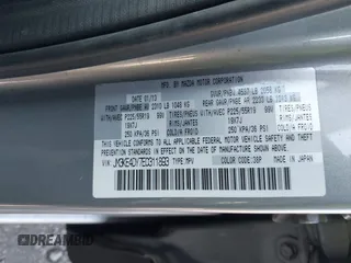 2014 Mazda CX-5 Grand Touring with VIN JM3KE4DY7E0311893, listed as a IAAI auction lot 42090872 with 102,154 mi miles and . Bid and sale history available at DreamBid. Image 9.