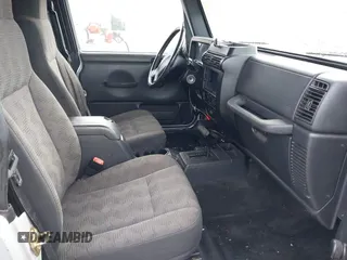 2005 Jeep Wrangler Unlimited with VIN 1J4FA44S25P340852, listed as a IAAI auction lot 41441671 with 139,302 mi miles. Bid and sale history available at carsss.com. Image 5.