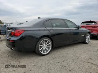 2015 BMW 7 Series 750Li xDrive z VIN WBAYF8C54FD654795, wystawiony jako Copart lot #82381894 z przebiegiem 56 968 mil mil oraz Szkoda całkowita • Salvage title. Historia ofert i sprzedaży dostępna na DreamBid. Obrazek 3.