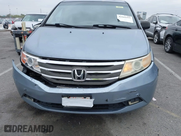 2012 Honda Odyssey EX-L with VIN 5FNRL5H66CB061847, listed as a IAAI auction lot 42162377 with 217,204 mi miles and . Bid and sale history available at DreamBid. Image 6.