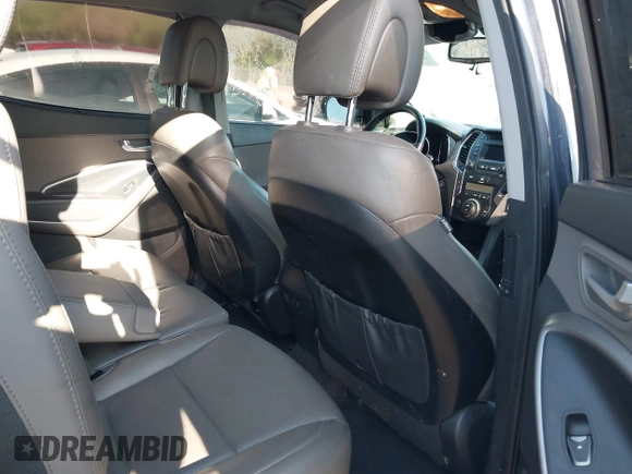 2016 Hyundai Santa Fe z VIN 5XYZUDLB3GG312687, wystawiony jako IAAI lot #42096854 z przebiegiem 162 586 mil mil oraz . Historia ofert i sprzedaży dostępna na DreamBid. Obrazek 8.