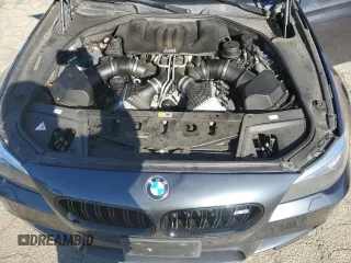 2014 BMW M5 z VIN WBSFV9C55ED593760, wystawiony jako Copart lot #49070765 z przebiegiem 128 365 mil mil oraz Tytuł czysty. Historia ofert i sprzedaży dostępna na DreamBid. Obrazek 11.